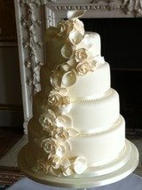 Sparkling Rose and Lily wedding cake Cleo's Creative Cakes Manor Road 