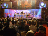 BBC Question Time<br />
Travelling around the UK Three Squared provides sound and occasionally projection facilities to BBC1’s flagship political debate programme Question Time each week. This picture is from Methodist Central Hall, London. Three Squared Live Ltd 34 Moor Park Industrial Estate, Tolpits Lane 