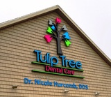 Signage on the building at South Bend dentist Tulip Tree Dental Care Tulip Tree Dental Care 51584 Indiana State Route 933 