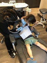 Sister watches on as Medical Lake dentist Dr. Alicia Burton works on her little brother's root canal Best Impression Dental: Dr. Alicia G. Burton, DDS 47 E Highway 902 