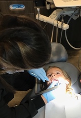 Medical Lake family dentist Dr Burton working on gentle root canal procedure at Best Impression Dental Best Impression Dental: Dr. Alicia G. Burton, DDS 47 E Highway 902 