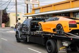 Seattle Towing Flatbed Tow Truck towing Lamborghini Murcielago in SODO