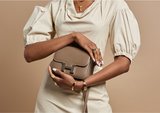 Indulge in the most desirable handbags by renowned fashion houses
