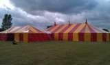 red and yellow striped marquee Bigtopmania Swallowcroft, Chapmans well 
