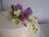 Single tier with sugar lisianthus and freesias from£135 Sharon Lord Cakes Fiddlers Field Croydon Road 