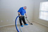 Man cleaning carpet with commercial cleaning equipment Best Sherman Oaks Carpet Cleaning 14431 Ventura Boulevard #423D 