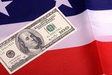 dollars on american flag