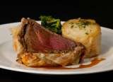 The signature Beef Wellington at The Penny Black Restaurant & Bar The Penny Black Restaurant & Bar 212 Fulham Road Chelsea 