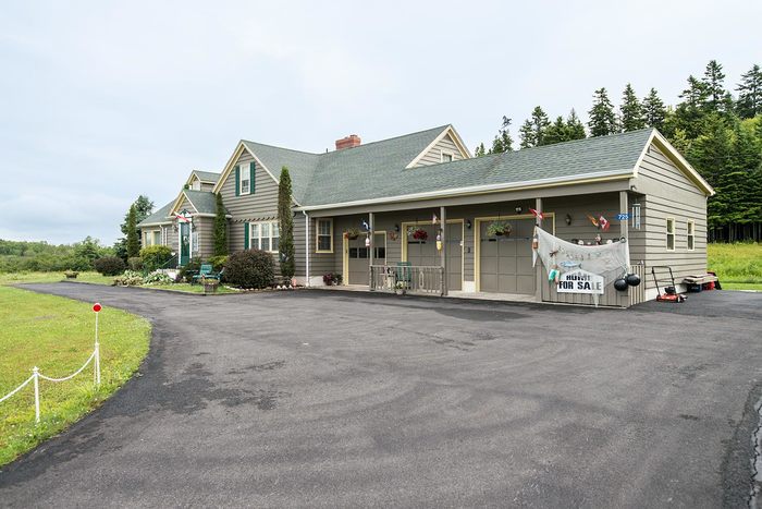 Our paved parking area is immense. FREE  Parking for up to 8 vehicles. Profile Photos of Harbour Tide Inn ~ Bed & Breakfast 725 Main Street - Photo 9 of 83