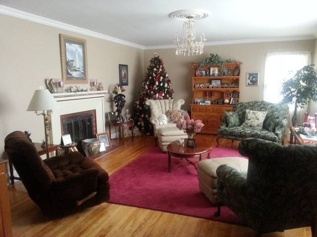 Our Living Room...and yes that is a permanent Christmas Tree. Profile Photos of Harbour Tide Inn ~ Bed & Breakfast 725 Main Street - Photo 16 of 83