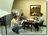 Corporate training video set-up in office setting.