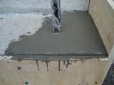 Broken concrete step corner re-inforced with drilled 