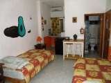 Private Avocado room 3 single beds, kitchenette, bathroom  Amigos Hostel Cozumel Calle 7 Sur # 571 x Ave 25 & 30 col. centro 
