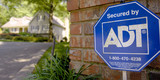 An ADT Security sign sits out in front of a home in Sandy Springs, GA on May 11, 2007. Photographer: Chris Rank/ Bloomberg News