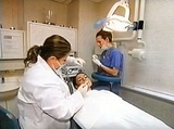 Dr Lana Rozenberg performs a dental veneers procedure at her cosmetic dentistry in NY Rozenberg Dental NYC 8 E 63rd St 