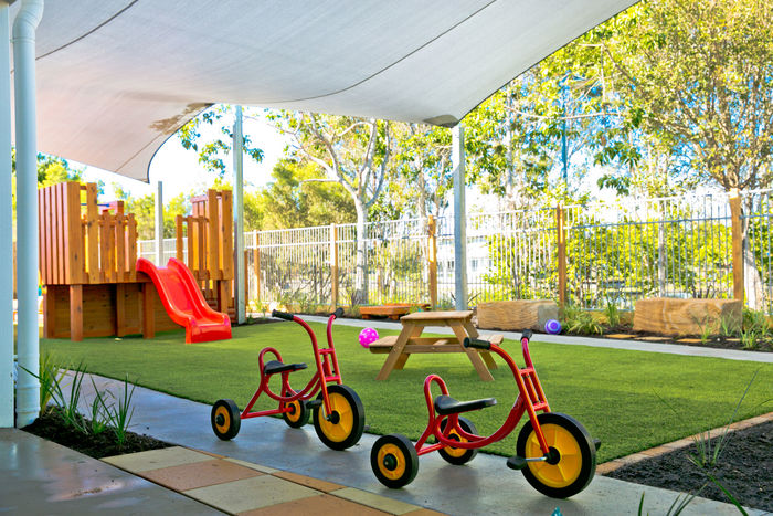 Petit early learning Caloundra West - Our outdoor play yard features a bike track and backs onto a beautiful water reserve Petit Early Learning Journey Caloundra of Petit Early Learning Journey Caloundra 4 Lomond Crescent - Photo 8 of 10