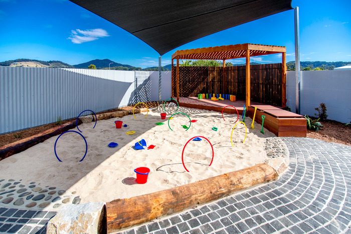 Petit childcare North Boambee Valley - Sandpit and Stage for Imaginative Play Profile Photos of Petit Early Learning Journey Coffs Harbour 1 Kiddell Pl - Photo 5 of 11