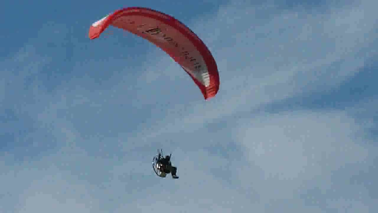Microlite flying over Weymouth Esplanade