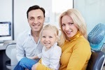 Family in the dental clinic Profile Photos of Littleton Common Dental 4 Robinson Road - Photo 1 of 3