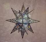 Our Tin Moravian Star Lights come with or without glass marble accents.  