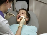 young boy at the dentist's clinic