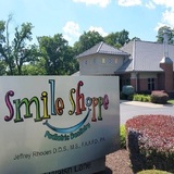 Signboard outside Smile Shoppe Pediatric Dentistry Rogers AR Smile Shoppe Pediatric Dentistry 5518 W Walsh Lane 