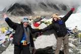 Mother and Daughter posing at Everest base camp, during an Everest Trek